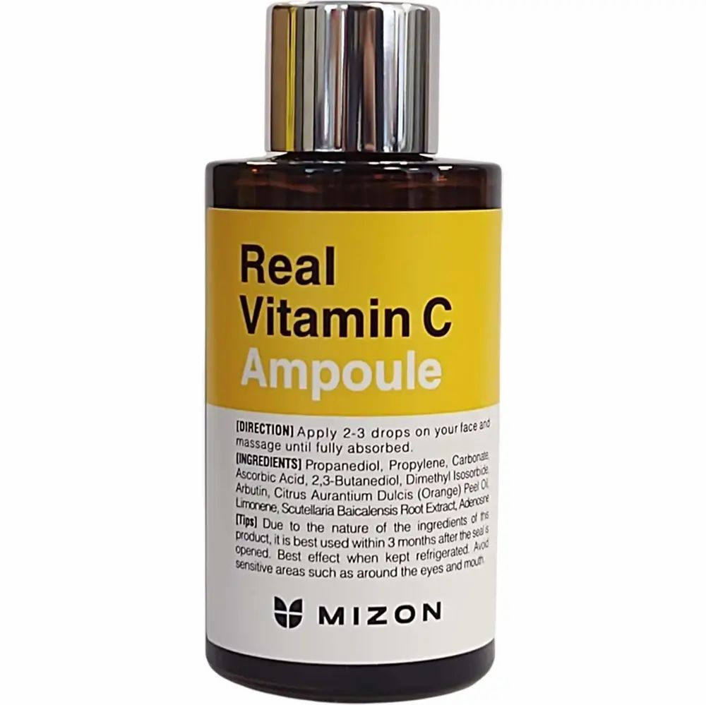 Braune Glasflasche mit gelbem Etikett. Aufschrift: Real Vitamin C Ampoule. Silberner Deckel. Marke: MIZON.