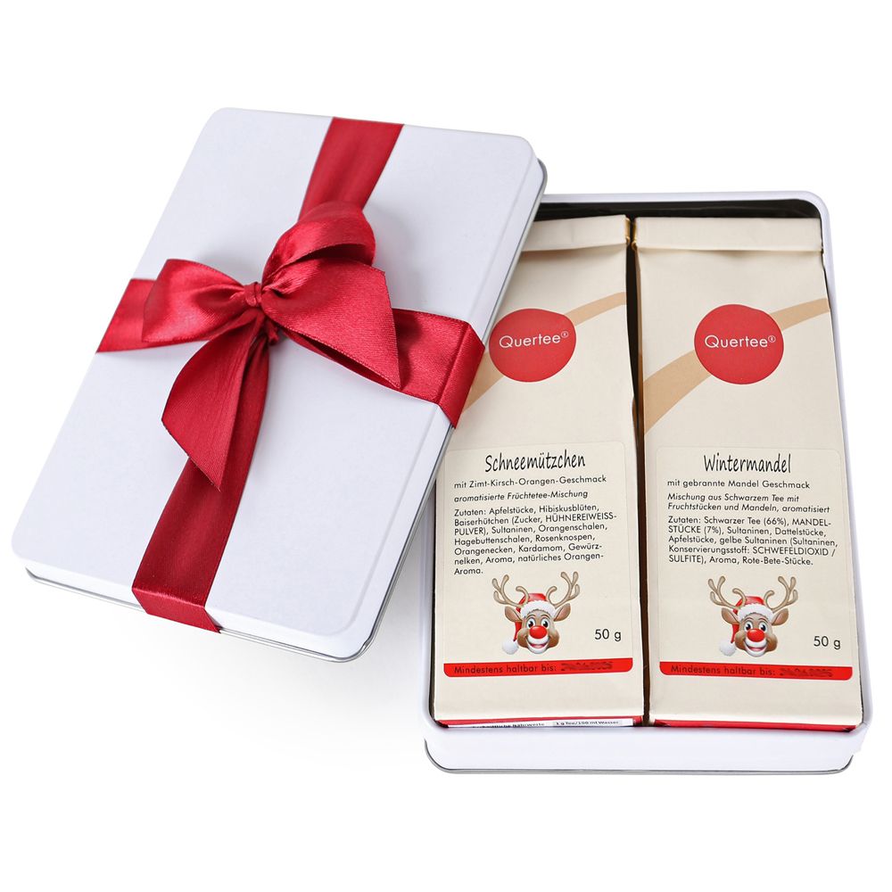 Weihnachtstee-Geschenkset in Dose. Enthält zwei Teebeutel mit Aufdruck. Rote Schleife auf weißer Dose. Aufschrift: Quertee.