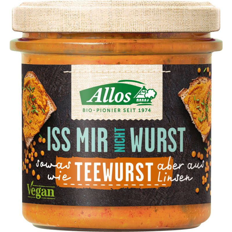 Glas mit Aufschrift "Allos Iss mir nicht Wurst Teewurst". Vegan, Bio-Pionier seit 1974. Aufschrift "sowas wie Teewurst aber aus Linsen".