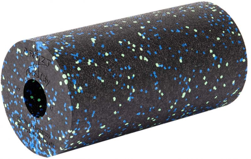 Zylindrisches Fitnessgerät mit Loch. Schwarze Oberfläche mit blauen und grünen Punkten. Aufschrift Artzt Vitality.