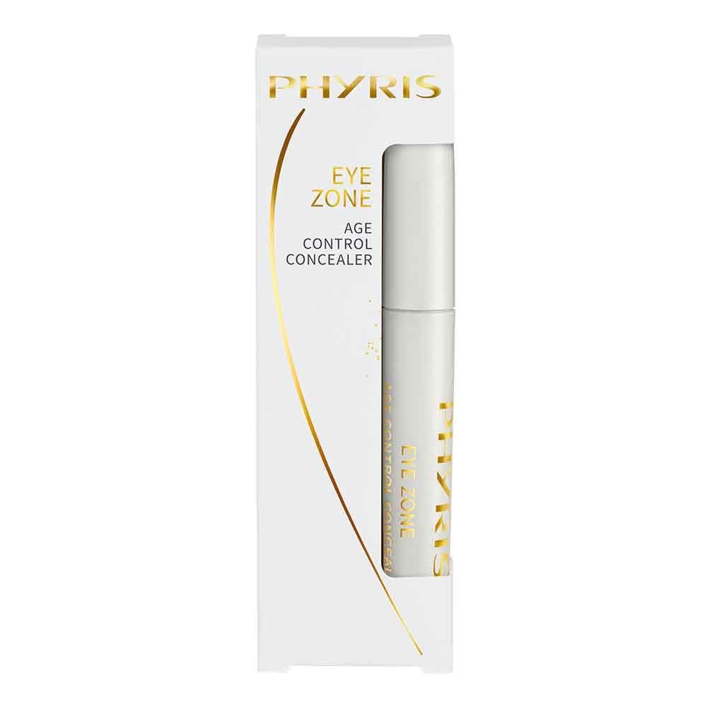 Weißer Concealer in Verpackung. Auf der Verpackung steht "PHYRIS", "EYE ZONE AGE CONTROL CONCEALER". Goldene Akzente.