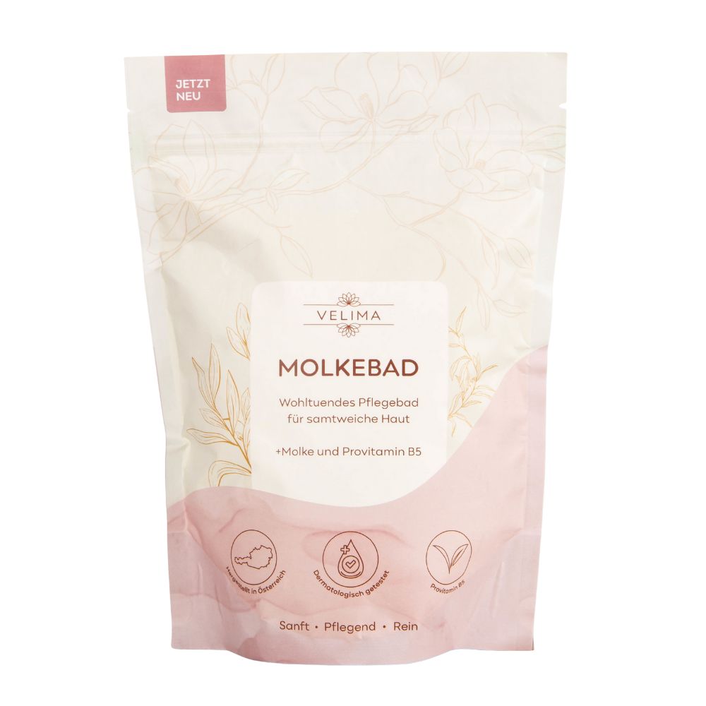 Produktverpackung Velima Molkebad. Rosa-weißer Beutel mit Produktnamen und Logo. "Jetzt neu".