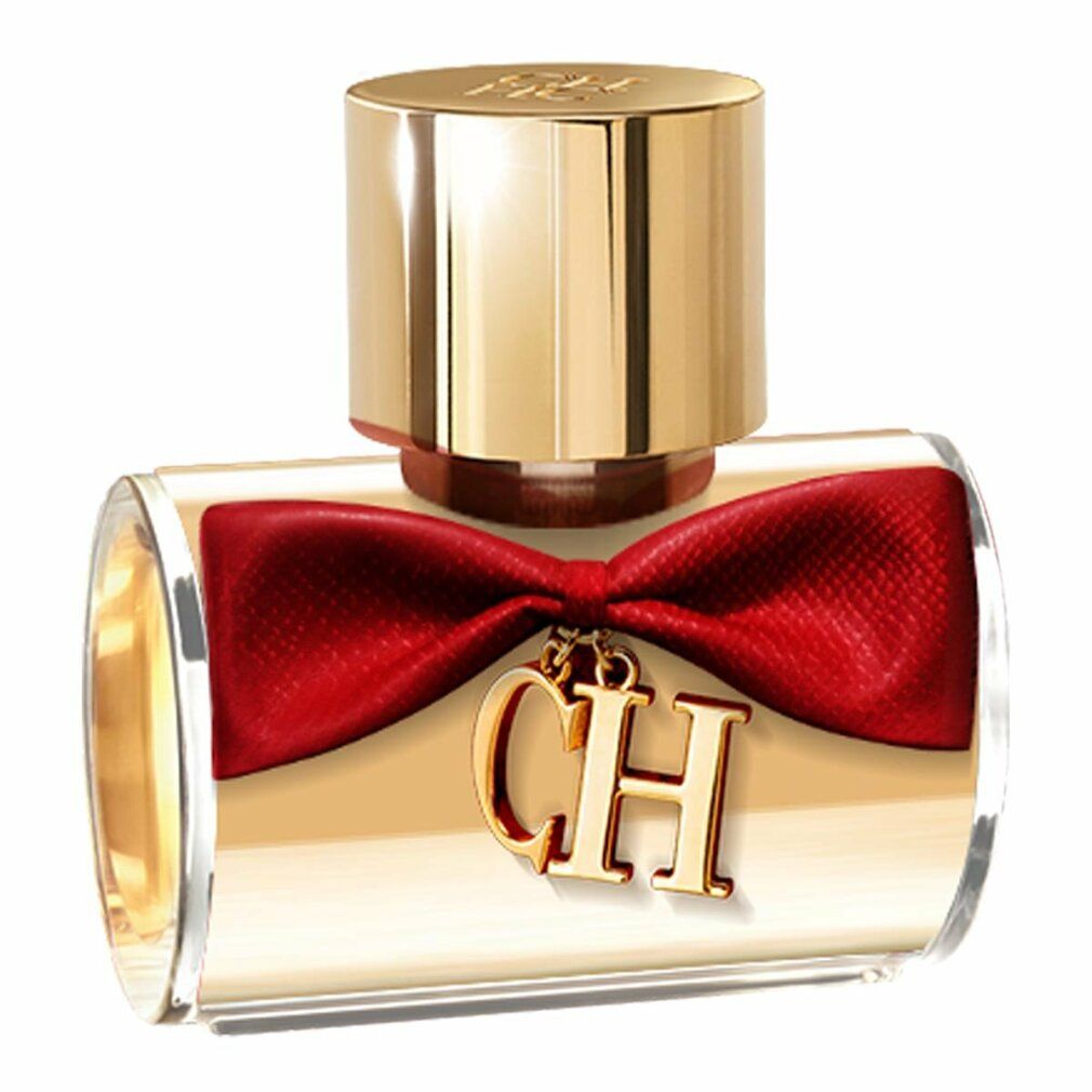 Parfümflakon mit roter Schleife und Anhänger. Goldfarbener Verschluss. Produktname: CH Privée.