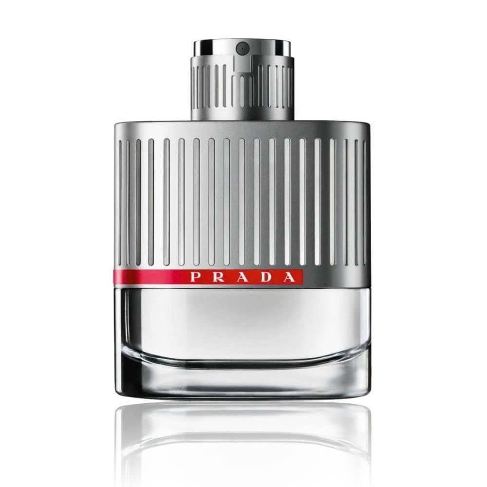 Prada Luna Rossa Eau de Toilette Flakon. Silberfarbenes Design mit rotem Streifen und Prada-Logo. Transparenter Behälter.