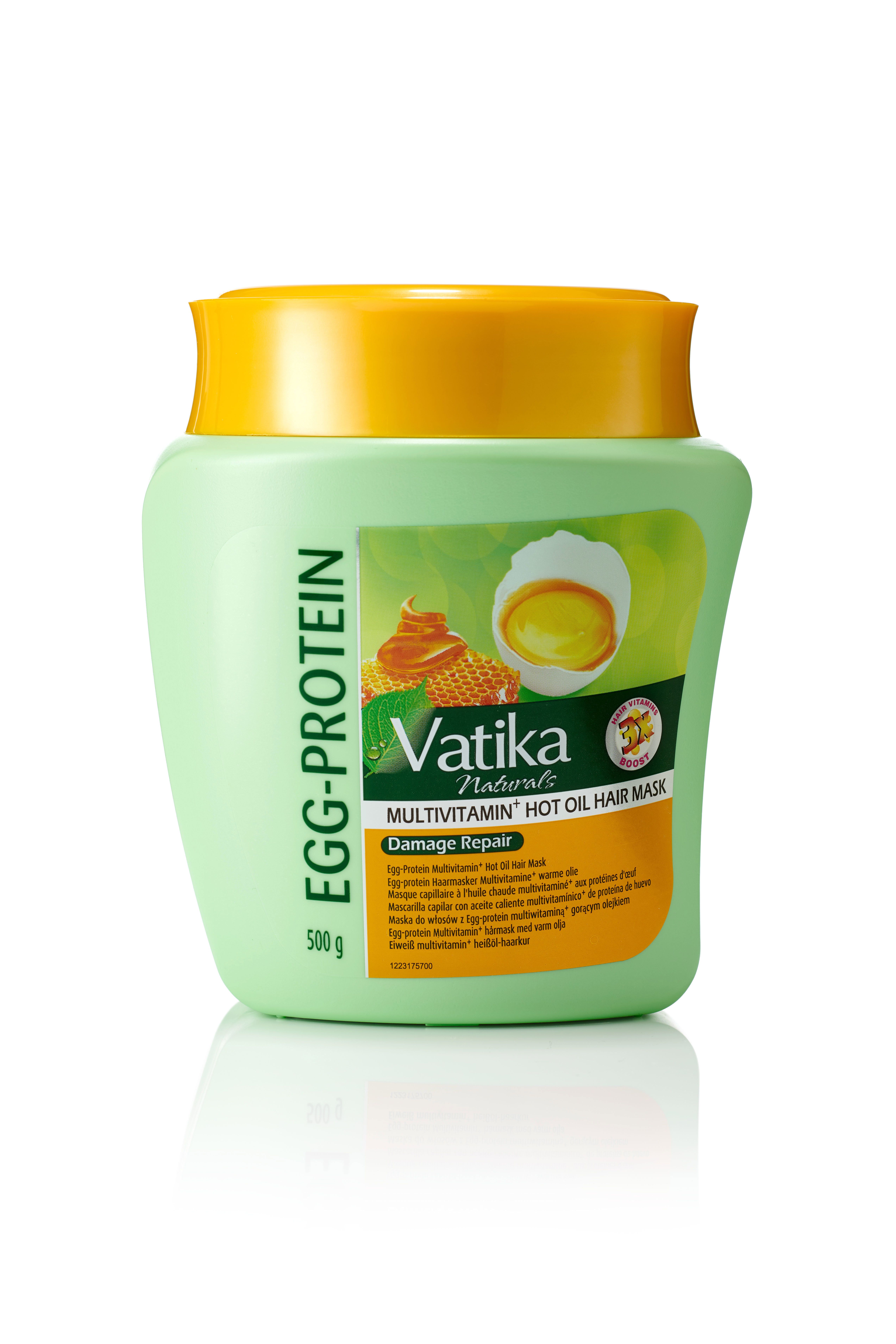 Grüne Haarmaske mit gelbem Deckel. Text: Vatika Naturals, Egg-Protein, Multivitamin, Hot Oil Hair Mask, Damage Repair. 500g.
