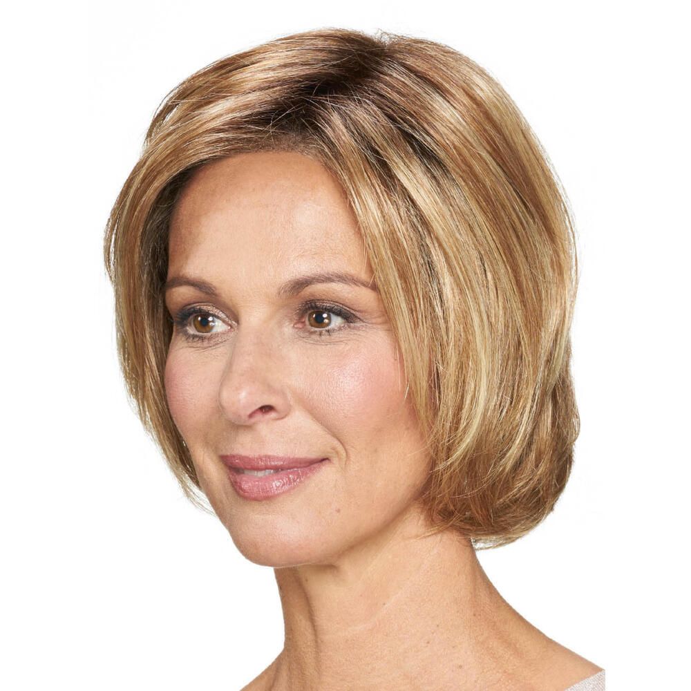 Perücke STOCKHOLM, blond, kurze Haare. Frau im Profil, Blick zur Seite. Hellbraune Strähnen.