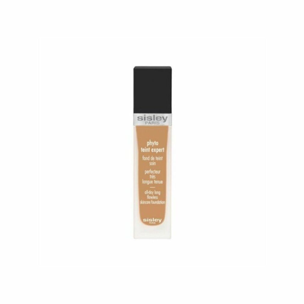 Sisley Phyto-Teint Expert Foundation-Flakon. Schwarzer Deckel, transparente Basis. Text: Phyto-Teint Expert, Fond de teint soin, perfecteur, longue tenue.