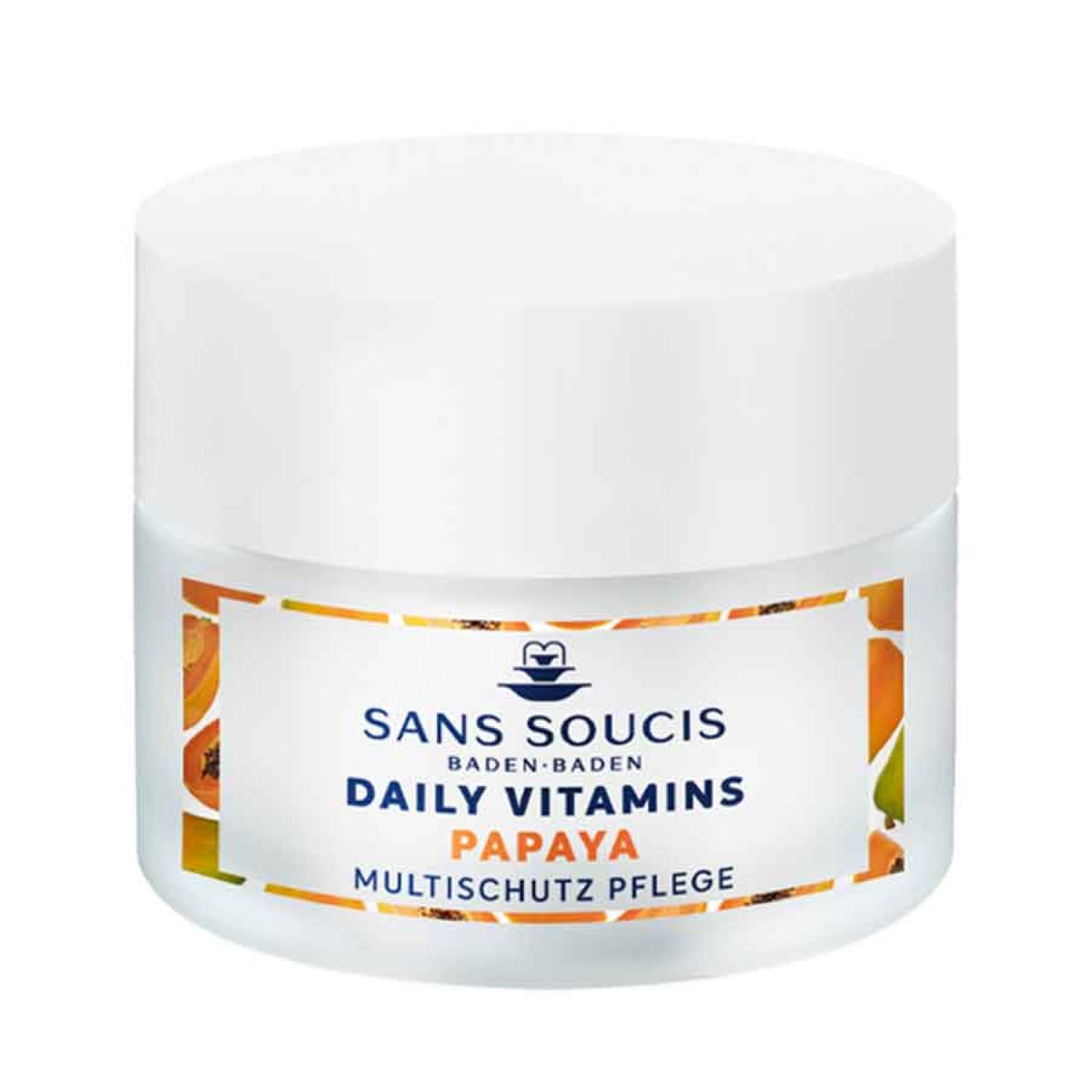 Weißer Tiegel mit Aufschrift. Aufkleber mit Text: SANS SOUCIS, DAILY VITAMINS, PAPAYA, MULTISCHUTZ PFLEGE. Papaya-Dekoration.