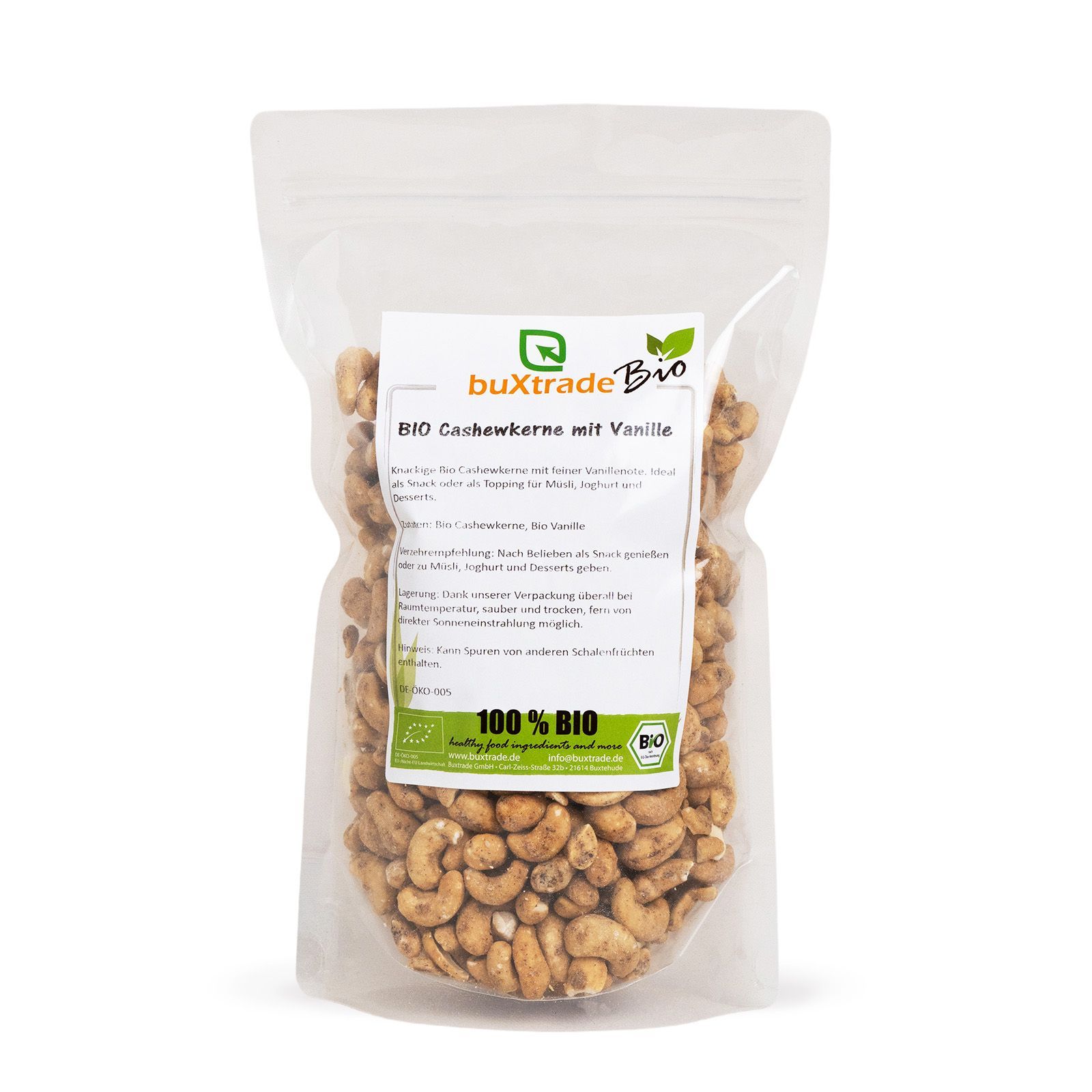 Transparente Verpackung mit Cashewkernen mit Vanille. Aufdruck: buXtrade Bio, 100% Bio-Siegel.
