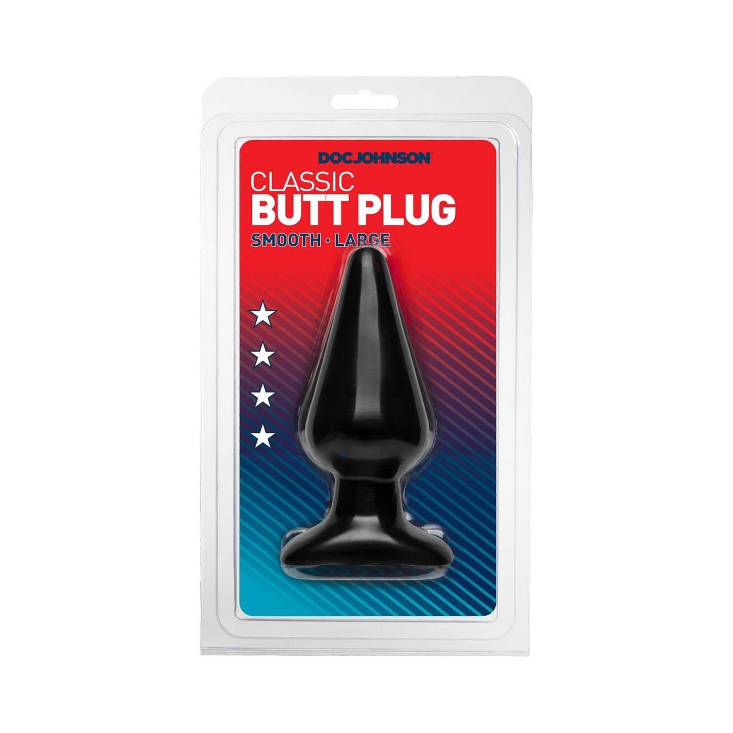 Schwarzer Analplug in Blisterverpackung. Aufschrift: "Classic Butt Plug". Marke: Doc Johnson. Glatte Oberfläche, konische Form.