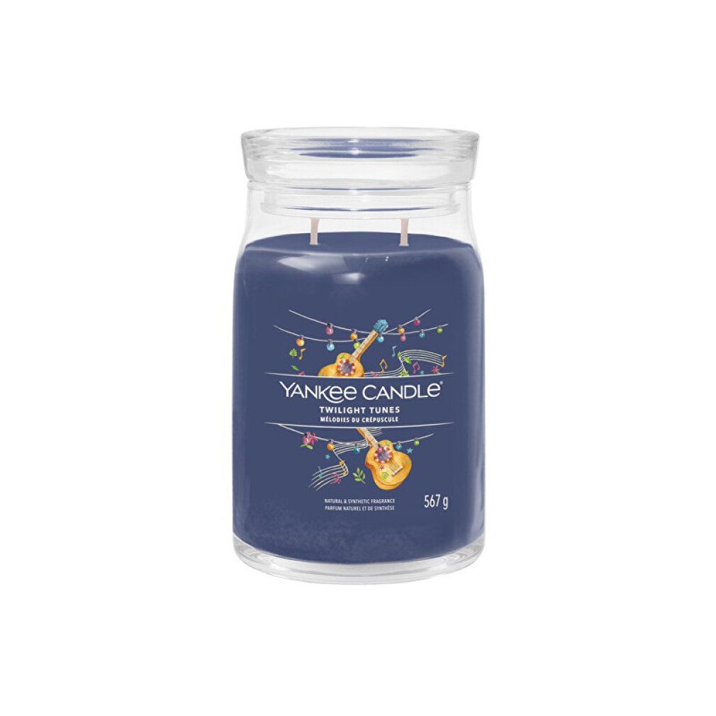 Duftkerze im Glas mit Deckel. Aufschrift: Yankee Candle Twilight Tunes. Abbildung von Musikinstrumenten. 567 g.