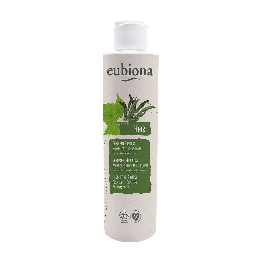 Zylindrische Flasche mit weißem Deckel. Aufschrift "eubiona" und grüne Blätter. Text: Schuppen Shampoo, Birkenblatt-Olivenblatt.