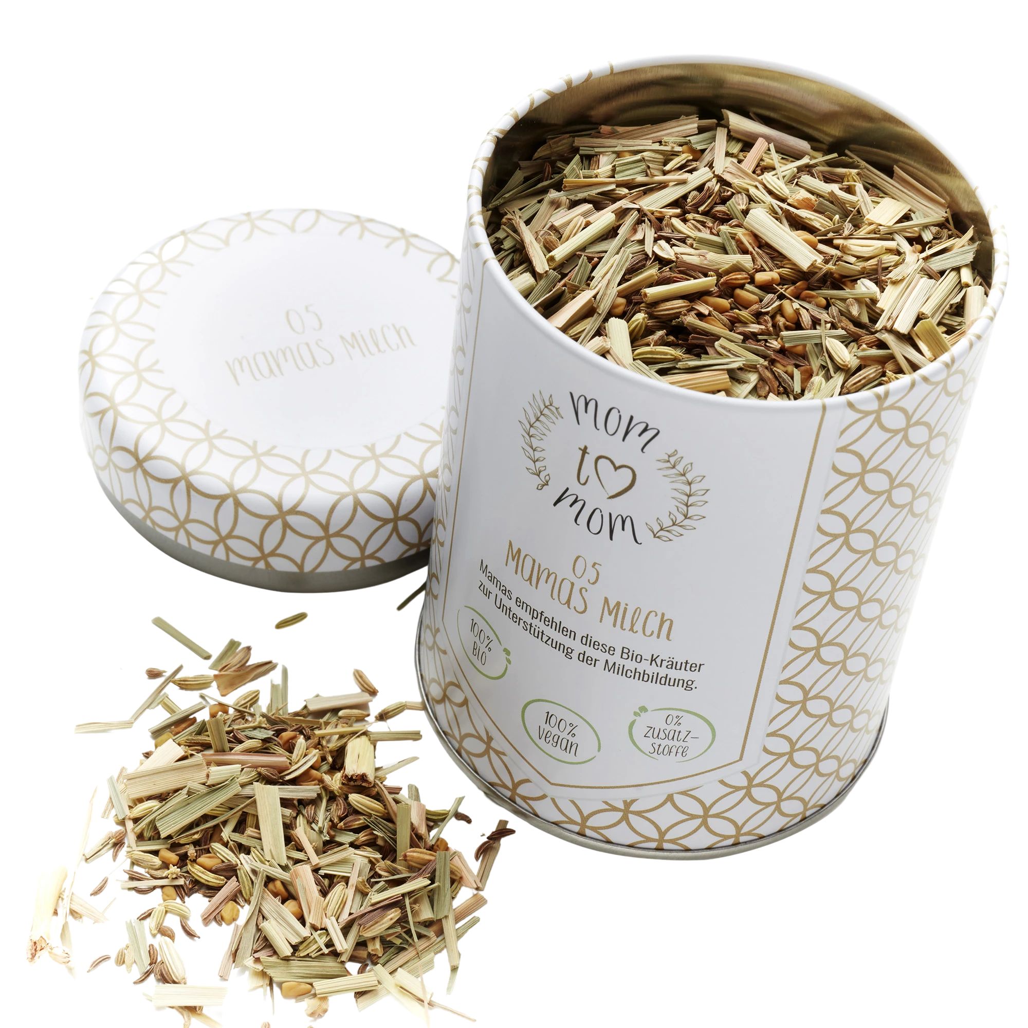 Geöffnete runde Dose mit Kräutermischung. Deckel daneben. Aufschrift: mom to mom, Mamas Milch. 100% Bio.