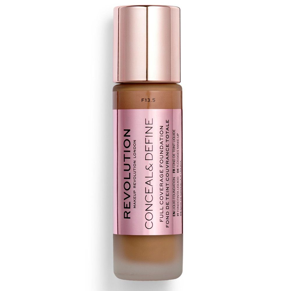 Flüssige Foundation in einer Glasflasche mit roségoldfarbenem Deckel. Auf dem Etikett steht "CONCEAL & DEFINE" und "REVOLUTION".