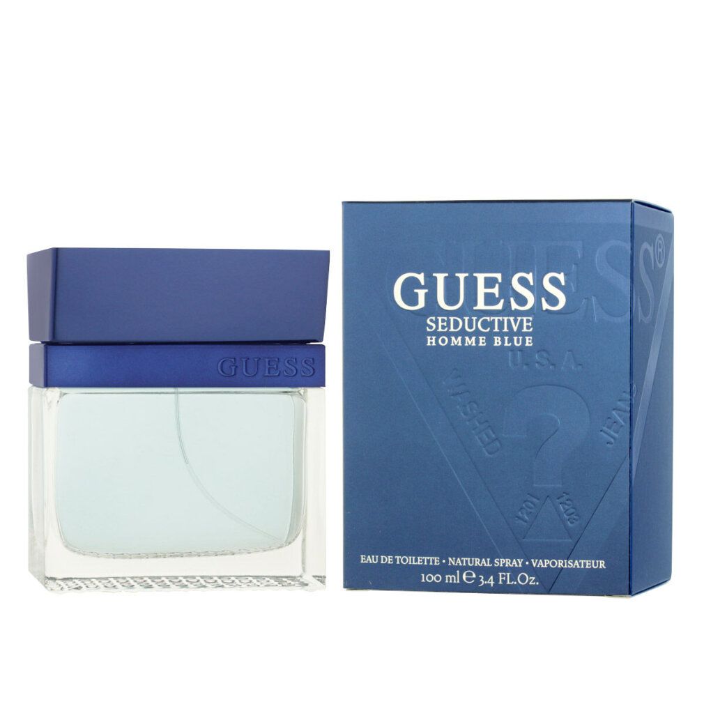 Blauer Flakon und Schachtel. Aufschrift "GUESS Seductive Homme Blue". Flakon mit hellblauer Flüssigkeit.
