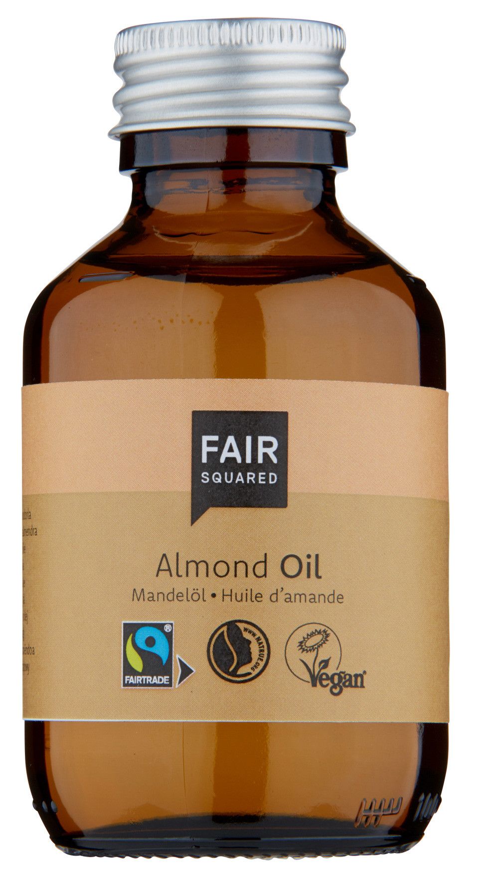 Braune Glasflasche mit silbernem Deckel. Etikett mit FAIR SQUARED, Mandelöl, Fairtrade-Siegel, Vegan-Logo.