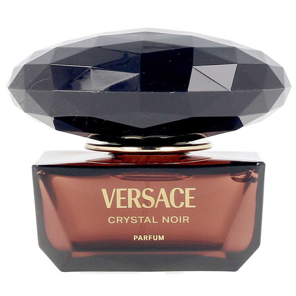 Flakon mit schwarzem, facettiertem Deckel und braunem Glas. Aufschrift: Versace Crystal Noir Parfum.