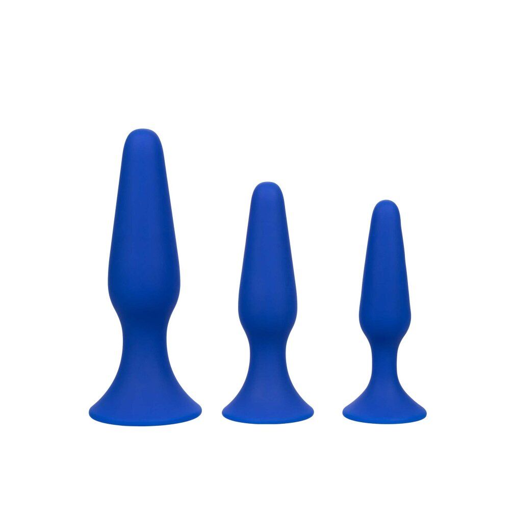 Drei blaue Anal Plugs in verschiedenen Größen. Konische Form, breite Basis.
