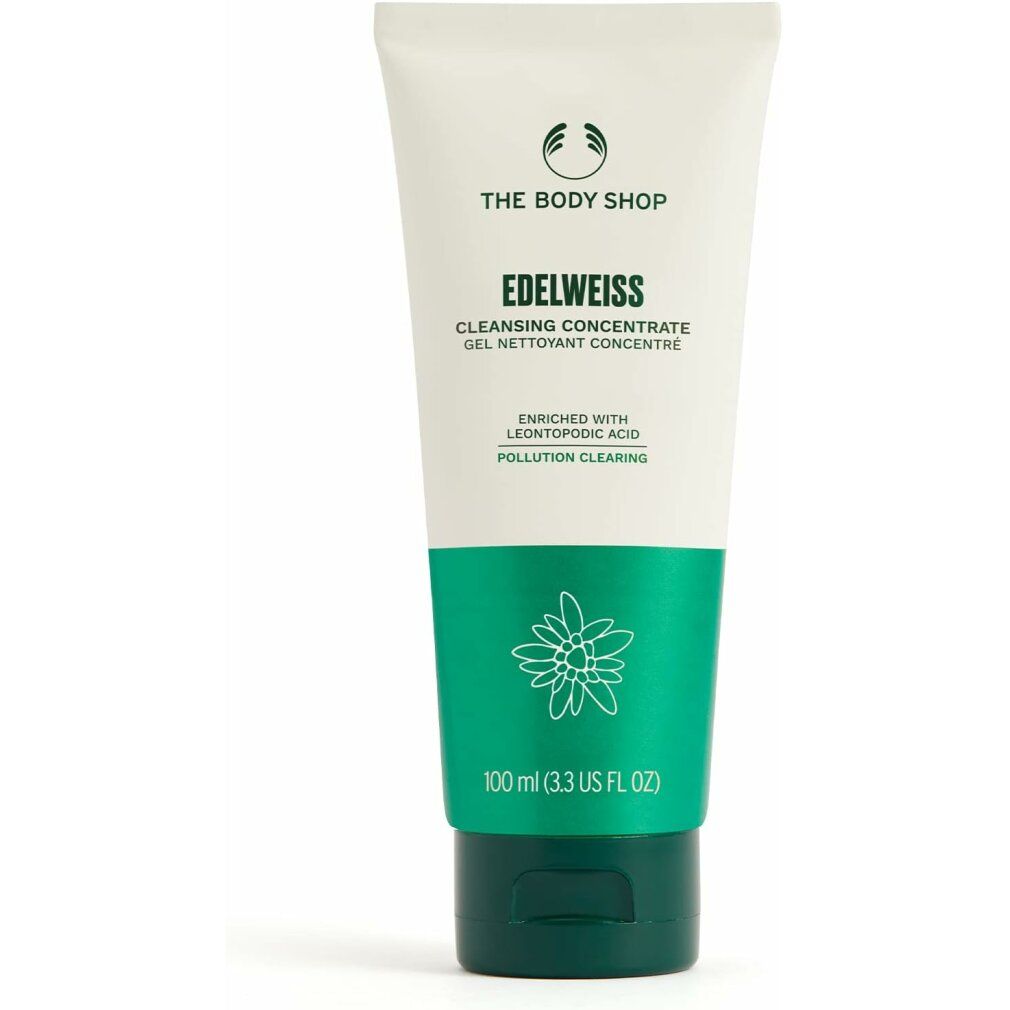 Tube mit "THE BODY SHOP"-Logo und "EDELWEISS Cleansing Concentrate". Grün-weißes Design, floraler Aufdruck, Text in Englisch und Französisch.