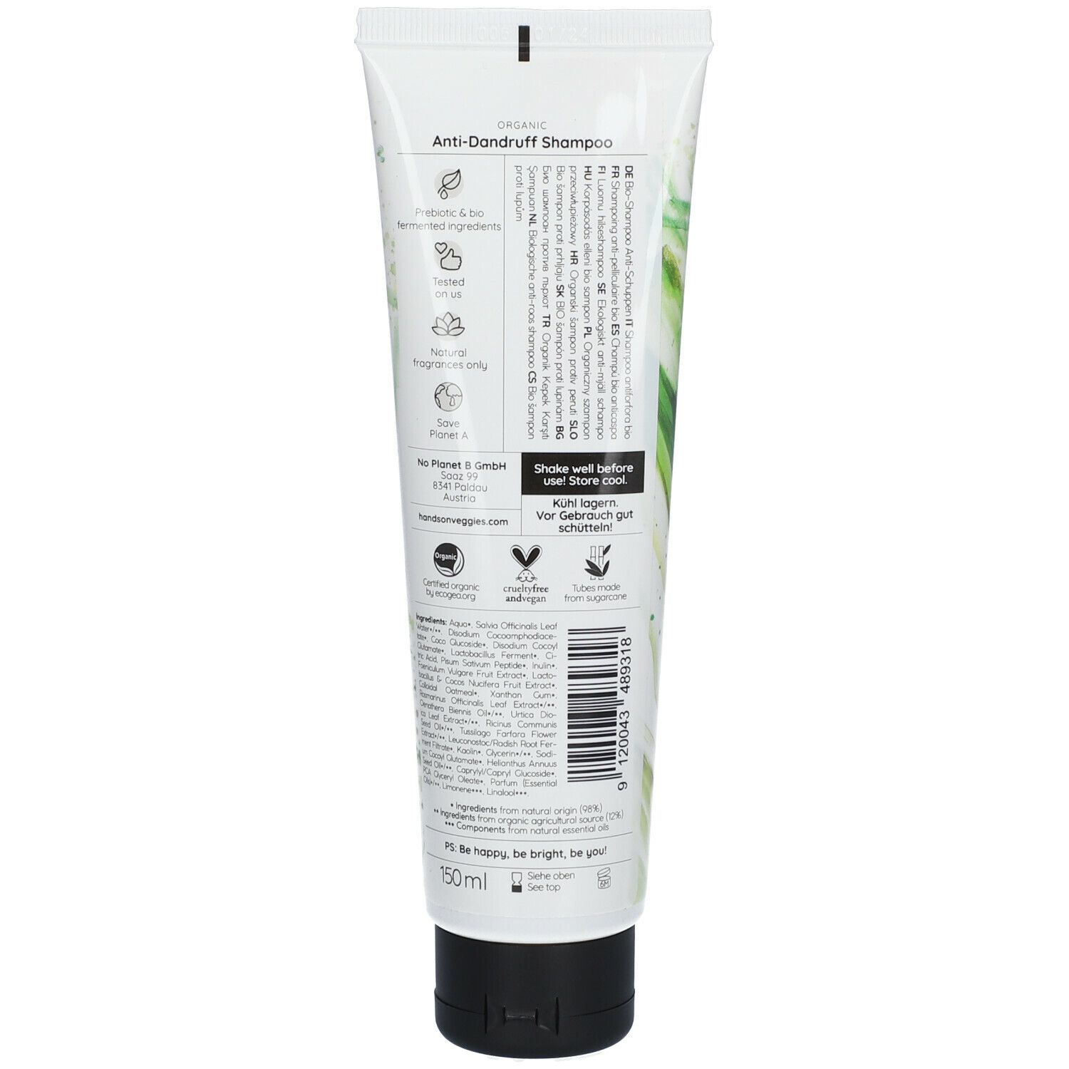 Shampoo-Tube mit Text und Illustrationen. Schwarzer Verschluss, weiße Tube mit grünen Elementen. Text: Anti-Schuppen Shampoo.