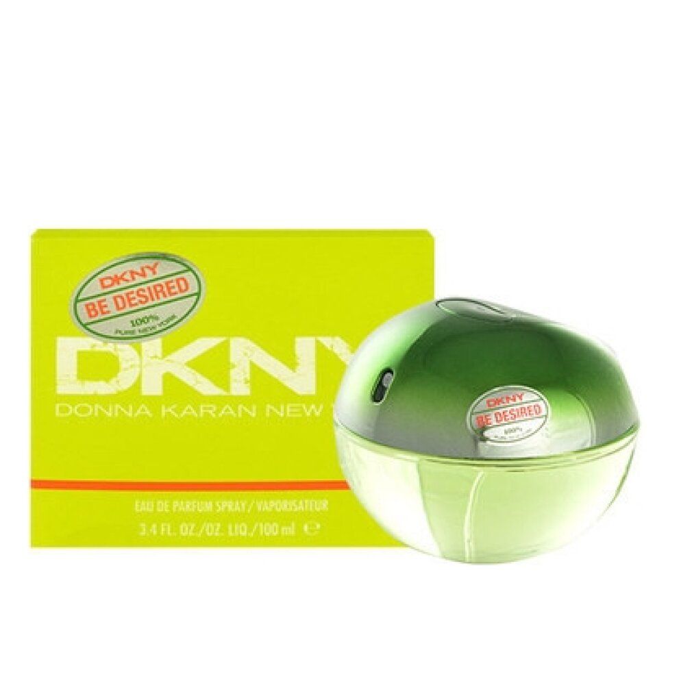 Parfümflakon und Verpackung. Flakon rund, grün-gelb. Verpackung rechteckig, gelb mit Schriftzug DKNY Be Desired.
