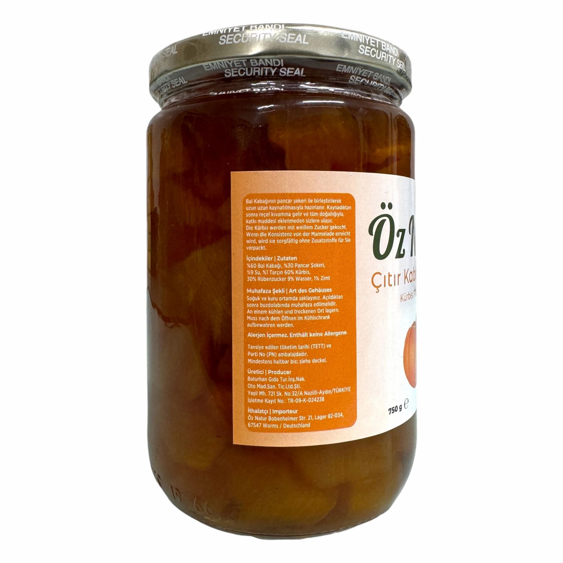 Glas mit Kürbis-Konfitüre. Rückseite mit Text und Etikett. Aufschrift: Öz Natur, Kürbis. 750 g.