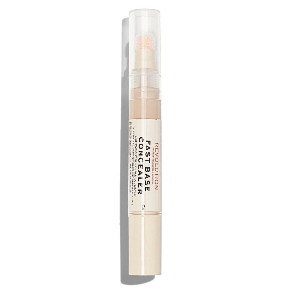 Beige Concealer-Stift mit transparentem Deckel. Aufschrift: Fast Base Concealer. Schwamm-Applikator. Vertikale Ansicht.
