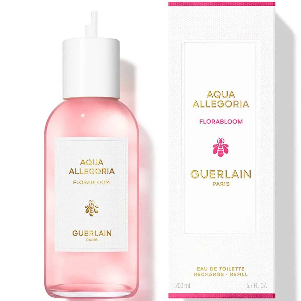 Rosa Flasche mit weißem Verschluss und Verpackung. Aufschrift "Aqua Allegoria Florabloom" und "Guerlain".