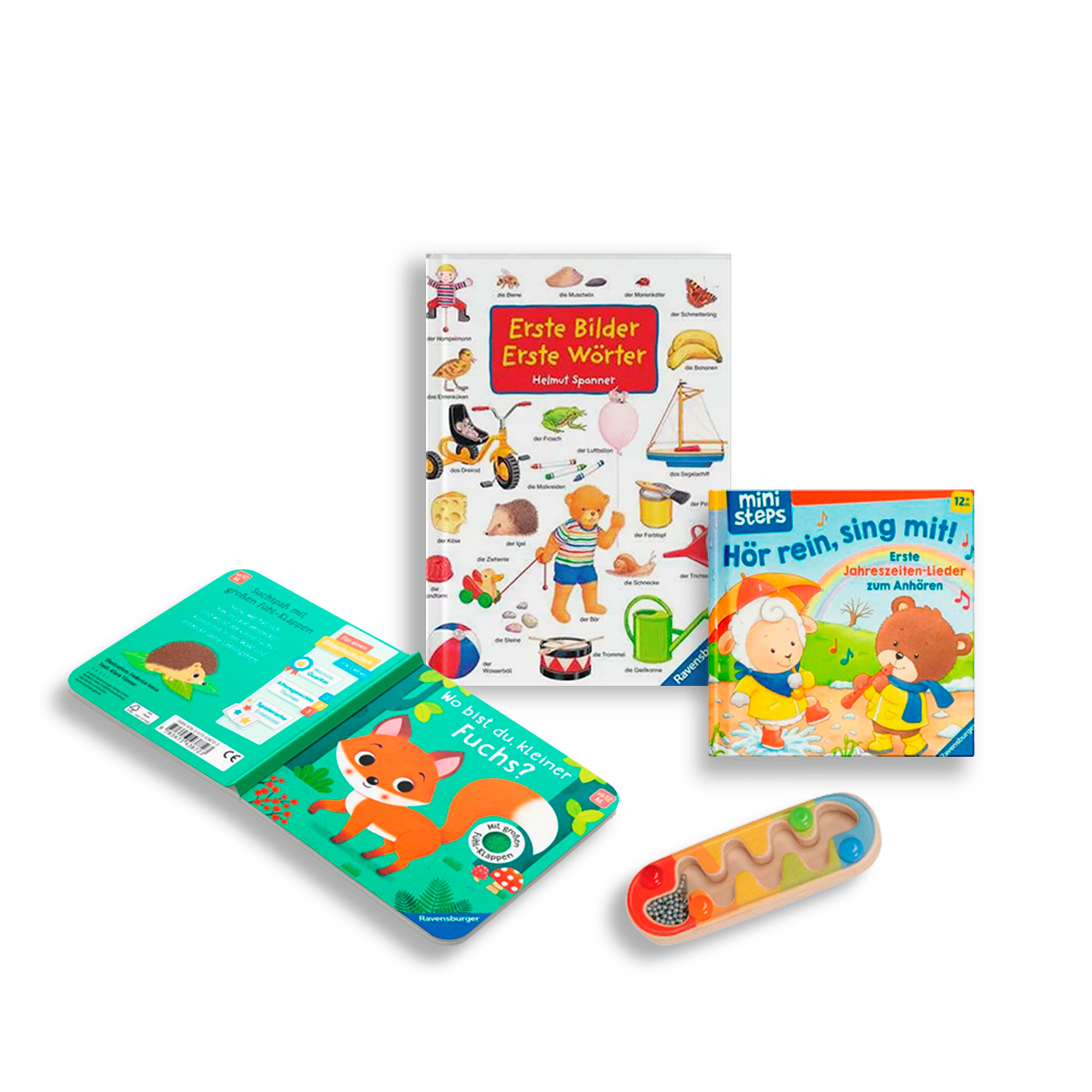 Mehrere Kinderbücher und ein Spielzeug. Bücher: 'Erste Bilder', 'Hör rein, sing mit!', 'Wo bist du, kleiner Fuchs?'.