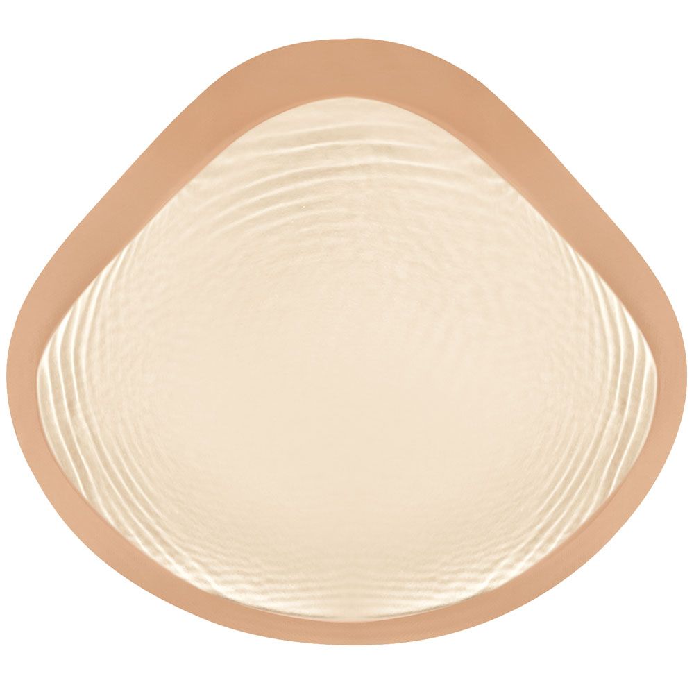 Brustprothese, beige mit wellenförmiger Oberfläche und braunem Rand.