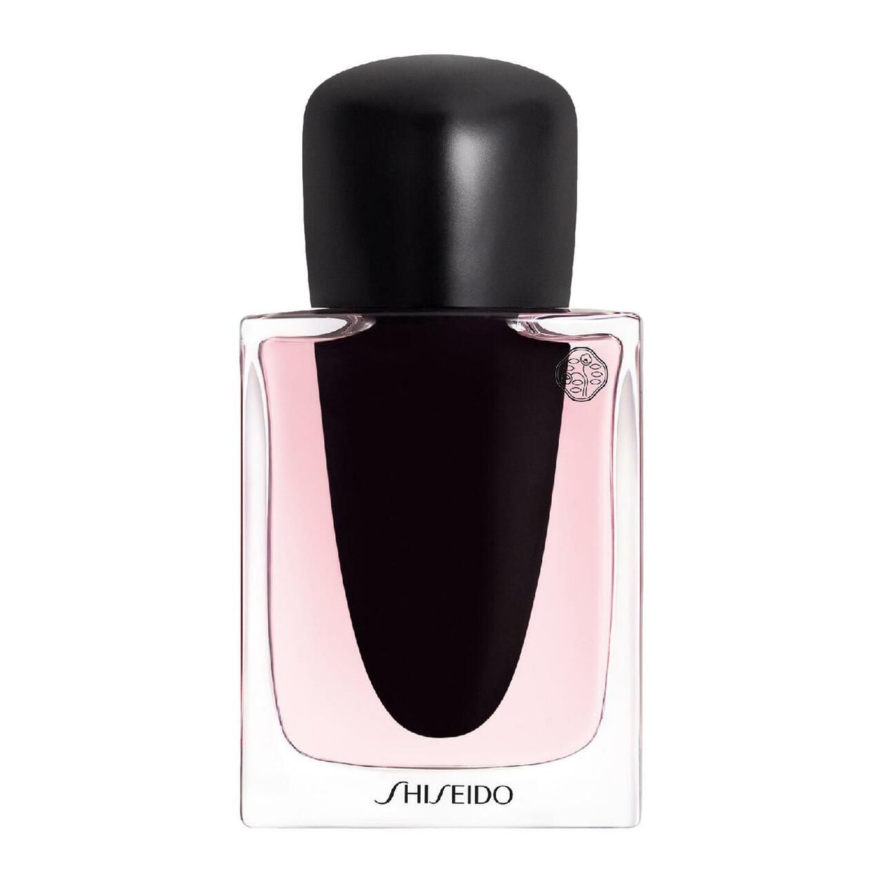 Rechteckiger Flakon mit schwarzem Verschluss. Rosa Flüssigkeit. Unten steht "SHISEIDO".