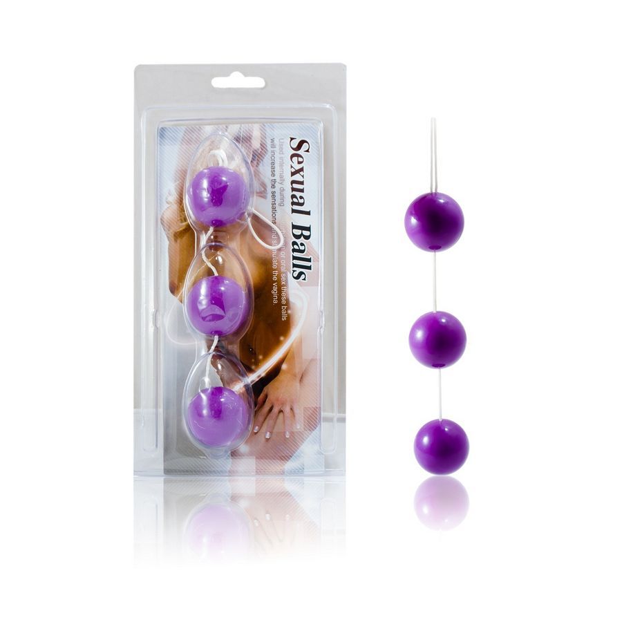 Drei violette Kugeln an einer Schnur, in Blisterverpackung. Aufschrift: Sexual Balls.