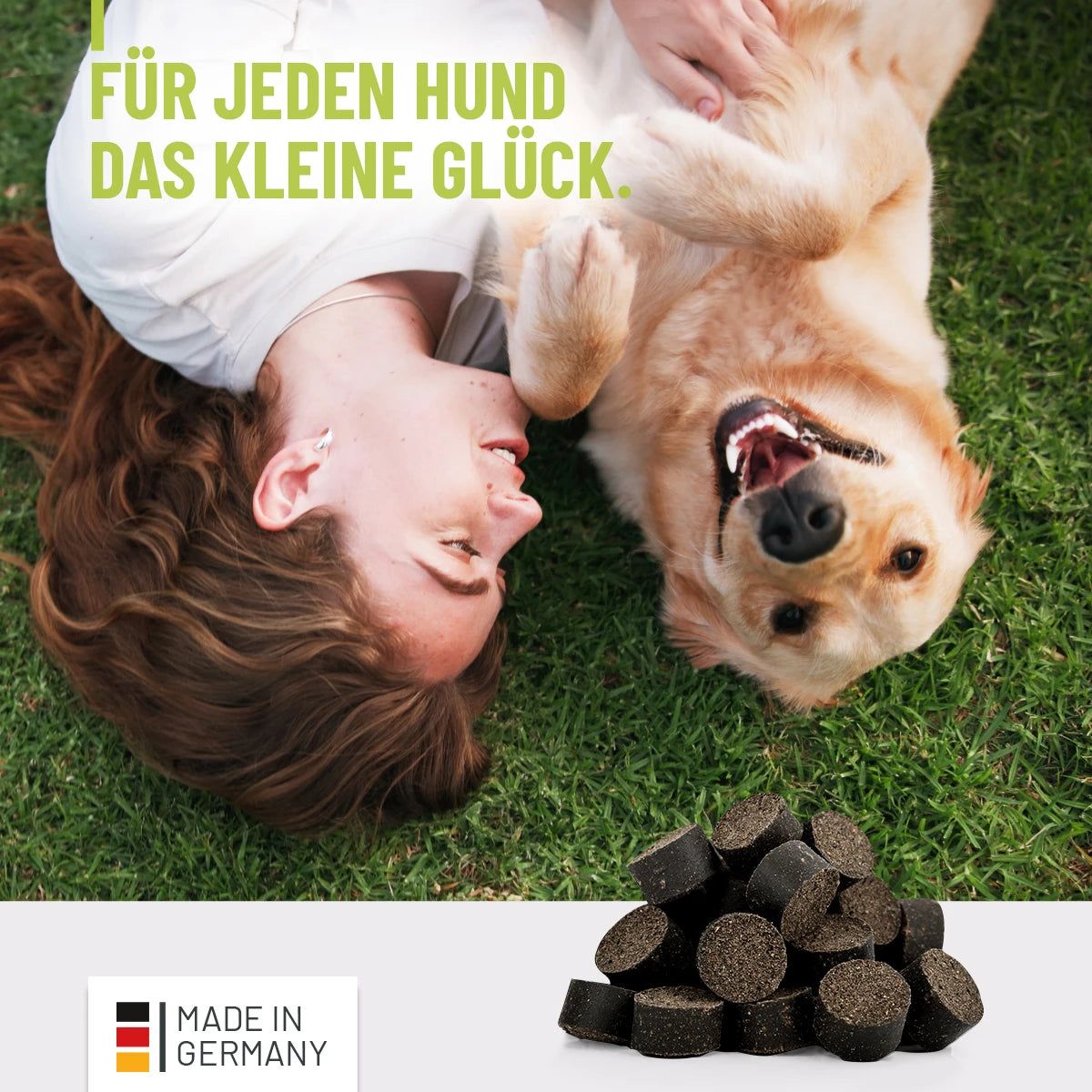 Person und Hund auf Rasen. Text: Für jeden Hund das kleine Glück. Haufen Drops. Made in Germany.