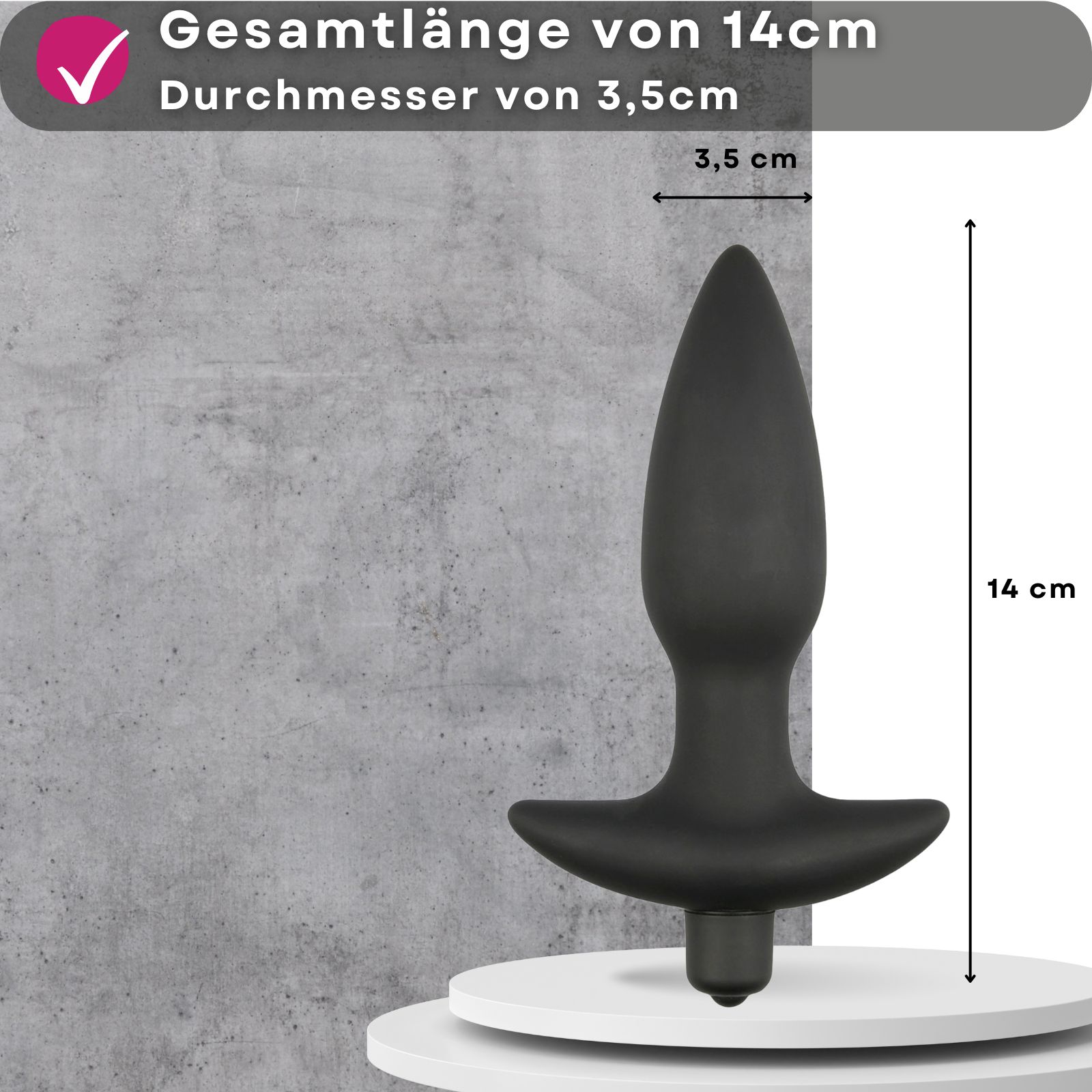 Schwarzer Analplug aus Silikon. Konische Form mit T-förmiger Basis. Text: Gesamtlänge von 14cm, Durchmesser von 3,5cm.