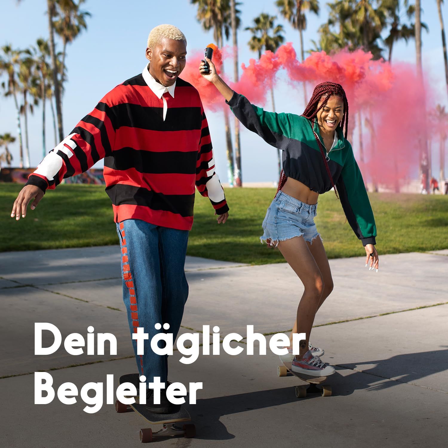 Zwei Personen auf Skateboards. Text: Dein täglicher Begleiter.