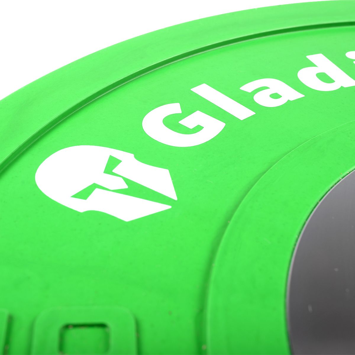 Detailansicht einer grünen Gummischeibe. Logo und Schriftzug GladiatorFit.
