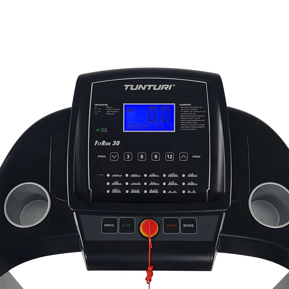 Nahaufnahme des Bedienfelds eines Laufbands. Digitales Display, Tasten und Not-Aus-Schalter. Marke Tunturi, Modell FitRun 30.
