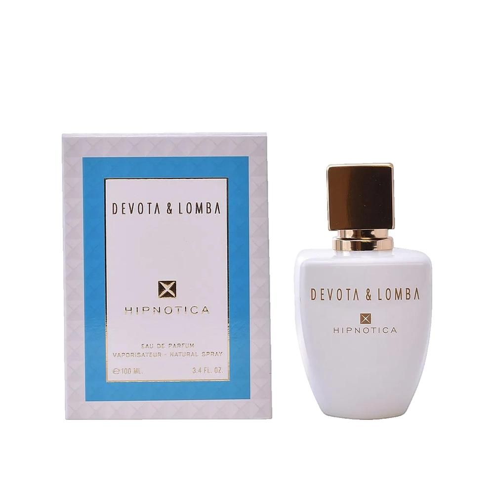 Weiße Flasche und Verpackung. Aufschrift: Devota & Lomba Hipnotica. Eau de Parfum. Goldfarbener Verschluss.