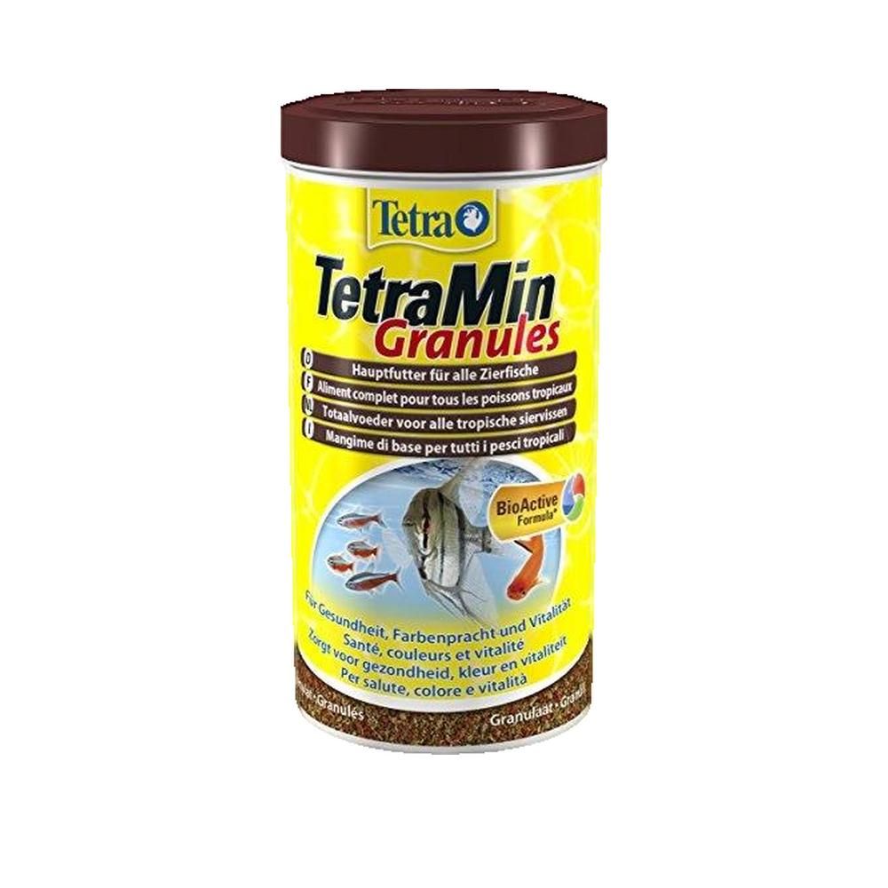 Zylindrische Dose mit braunem Deckel. Gelbes Etikett mit Produktnamen und Fischabbildung. Text in mehreren Sprachen.