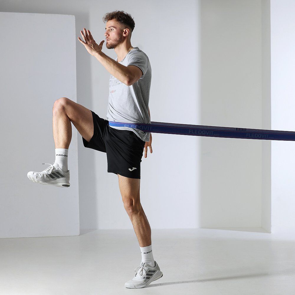 Blaues FLEXVIT Resist Band mit orangefarbenem Verschluss. Aufschrift FLEXVIT resist in Weiß.