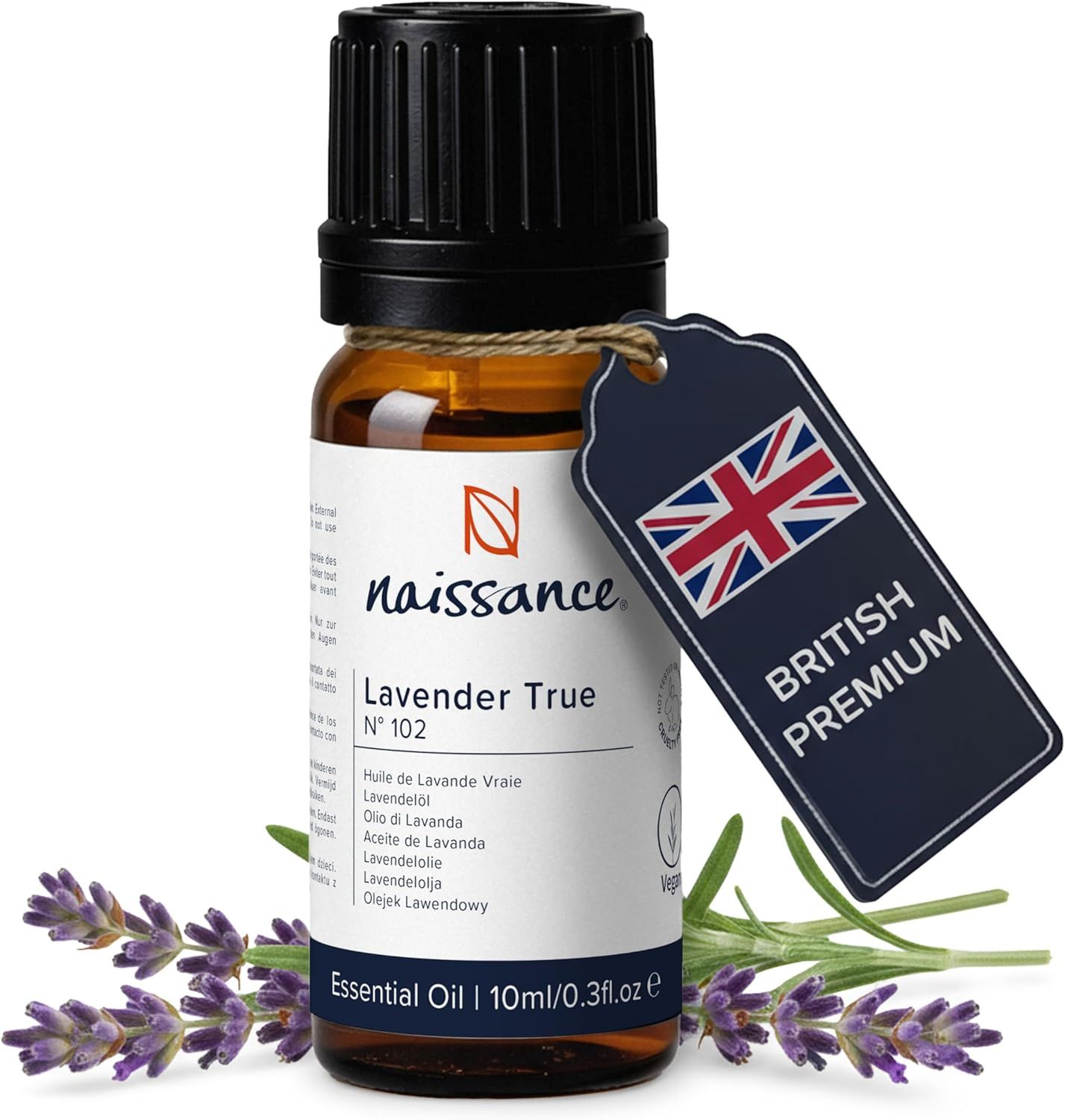Braune Glasflasche mit schwarzem Deckel. Etikett mit Produktinformationen. Naissance ätherisches Lavendelöl. British Premium-Etikett.