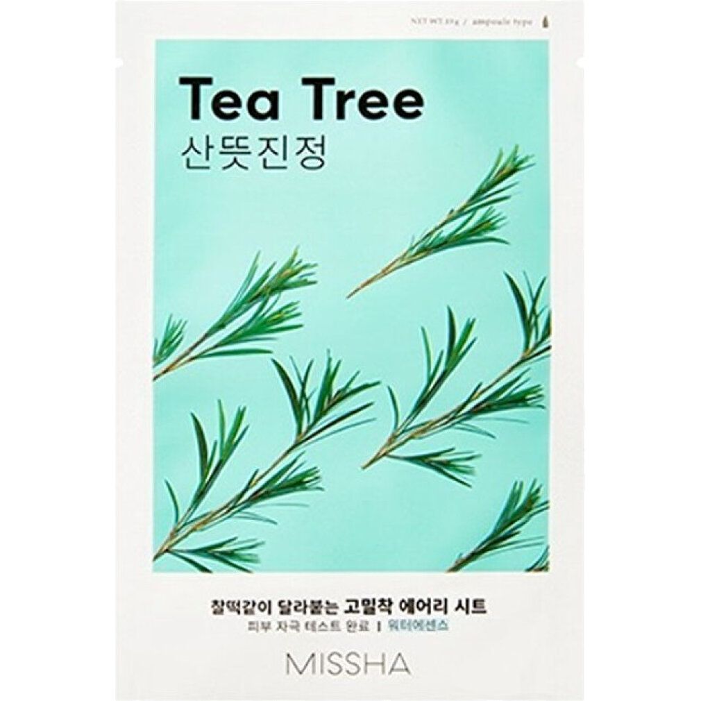 Weiße Verpackung mit grünem Hintergrund und Teebaum-Motiv. Text: Tea Tree, koreanische Schriftzeichen, MISSHA.