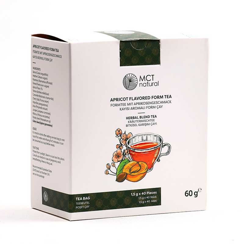 Weißer Karton mit MCT natural® Logo und Aufschrift 'Apricot Flavored Form Tee'. Illustration von Tee und Aprikosen. 60g.