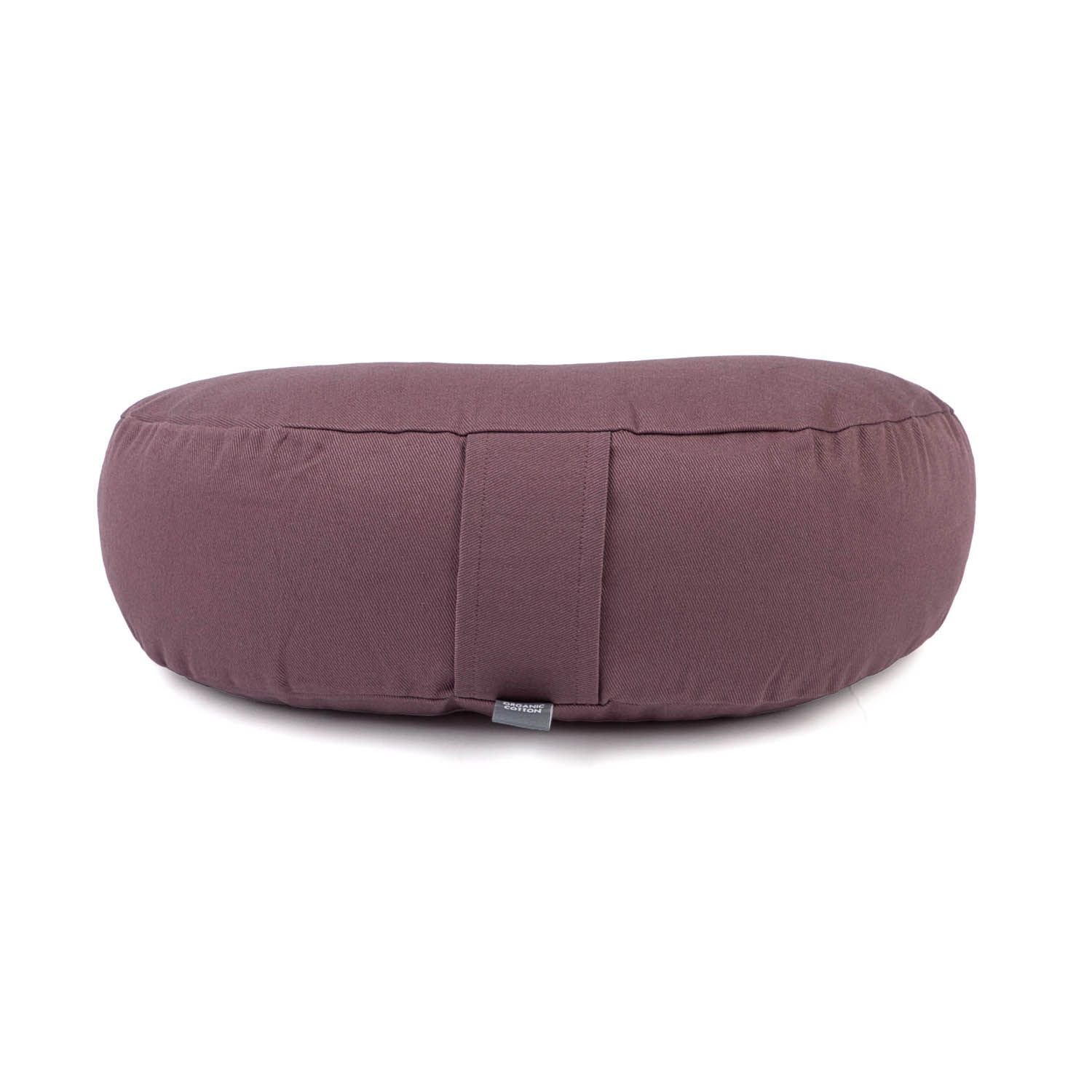 Violettes, rundes Meditationskissen mit Falten und einem Etikett.