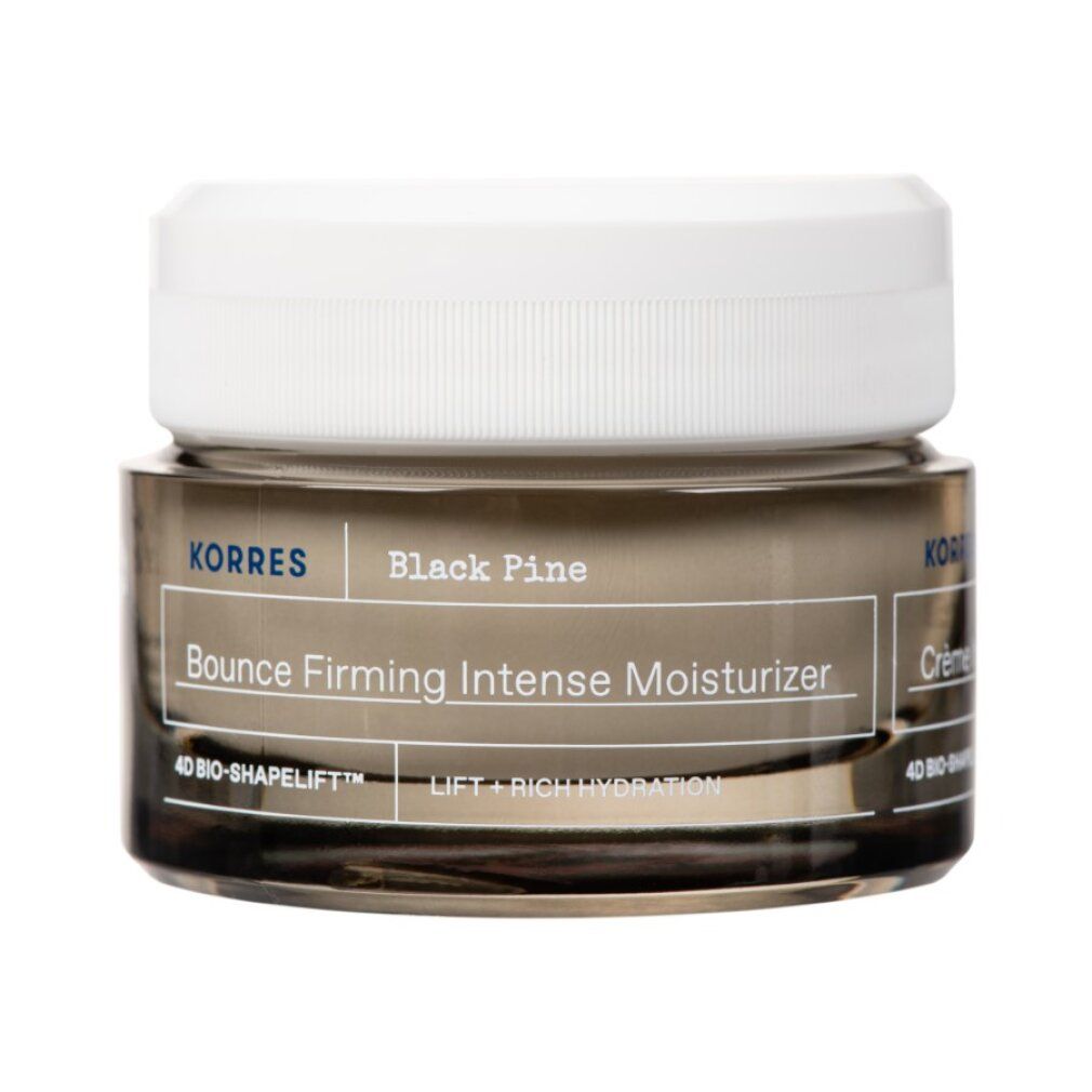 Tiegel mit Creme. Aufschrift: KORRES, Black Pine, Bounce Firming Intense Moisturizer. Weißer Deckel, transparente Dose.