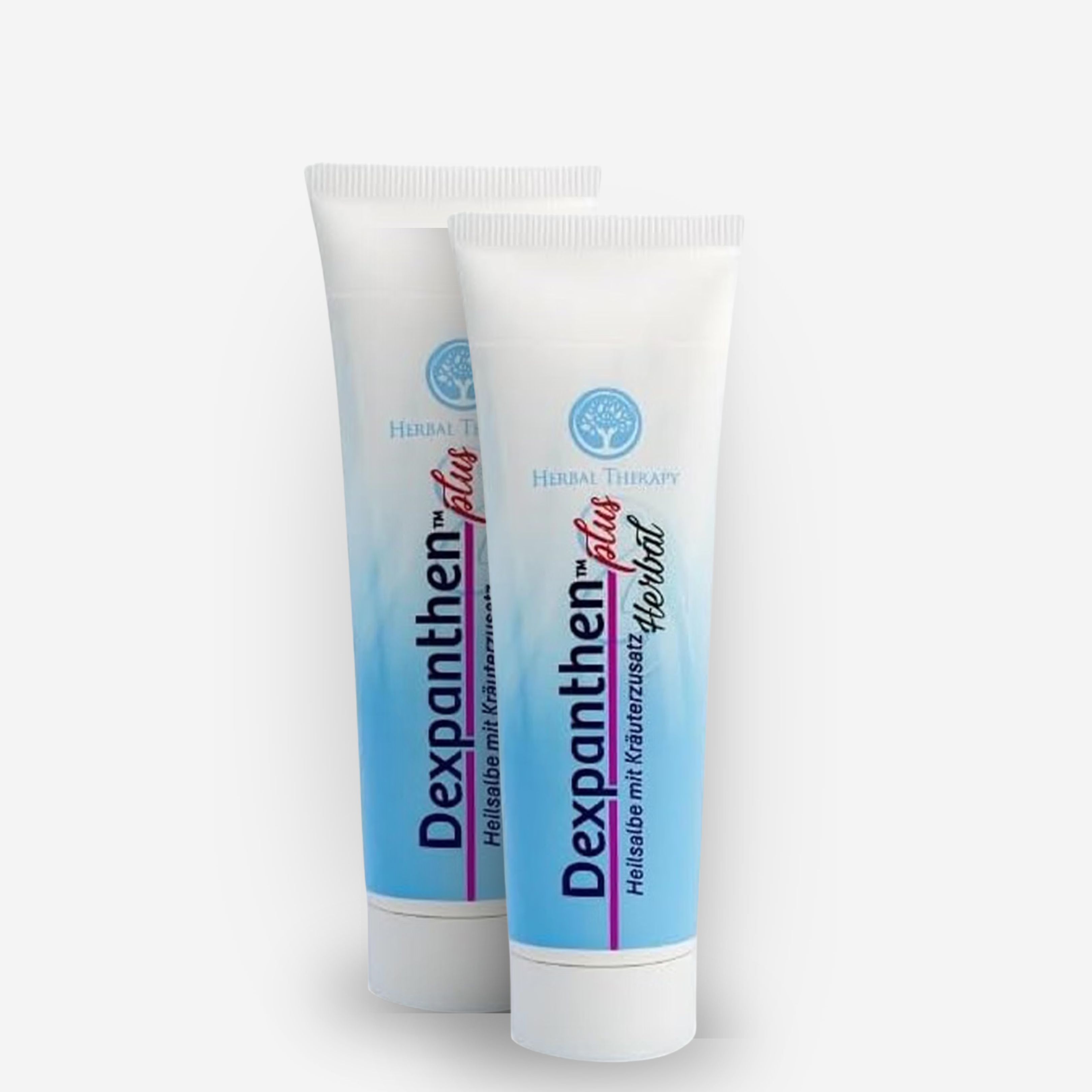 Zwei weiße Tuben Dexpanthenol Plus Herbal Salbe mit Kräuterzusatz.