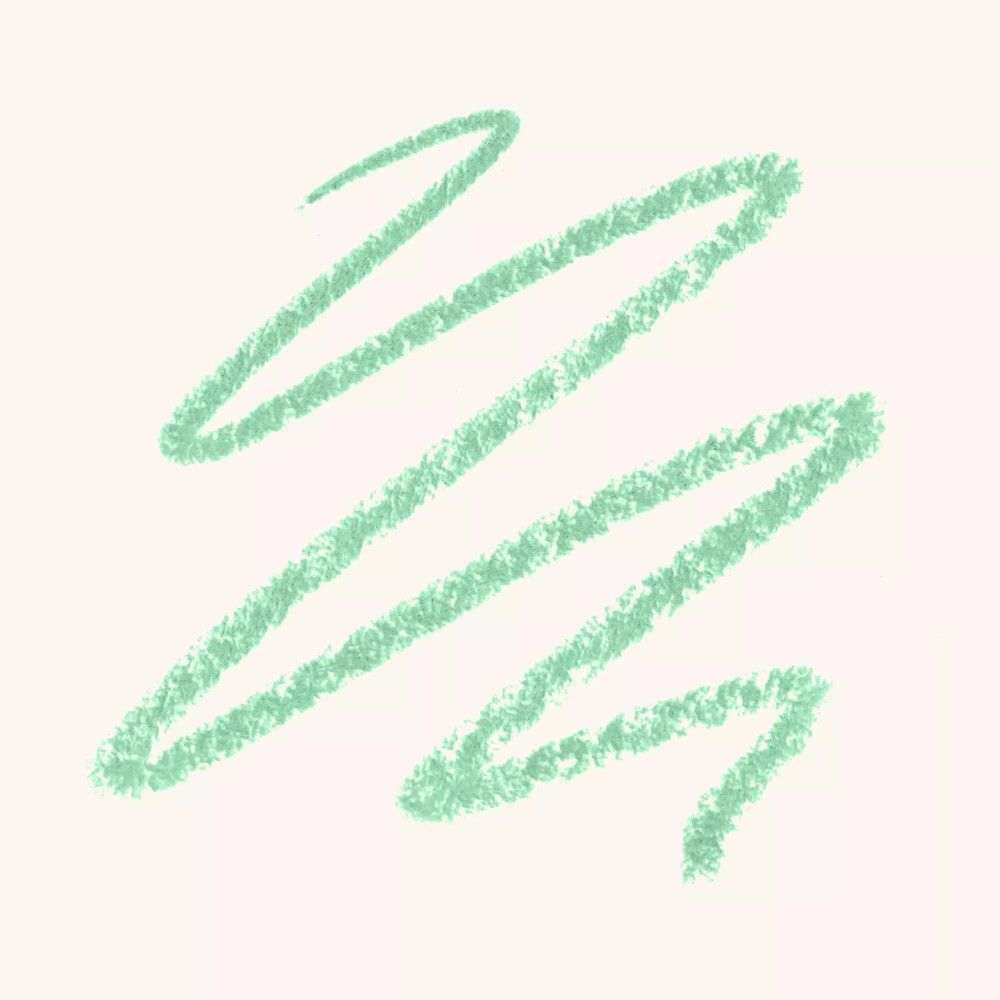 Hellgrüne Kajalstift-Striche auf hellem Hintergrund.