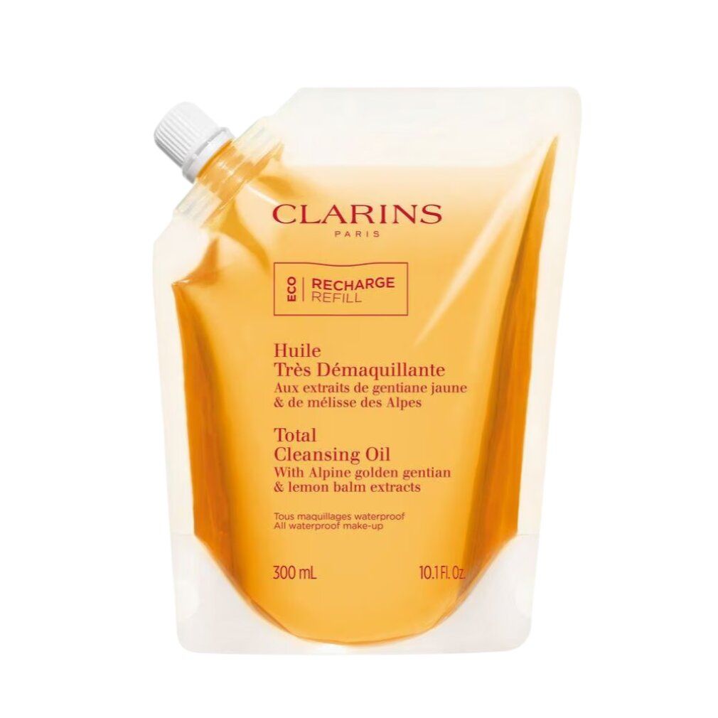 Clarins Total Cleansing Oil Nachfüllbeutel mit Schraubverschluss. Gelbe Flüssigkeit.