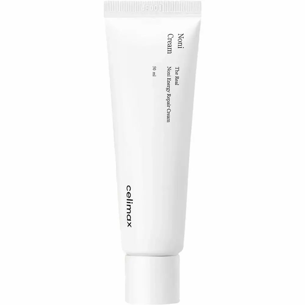 Weiße Tube mit Produktnamen und Marke. 50 ml. Text: The Real Noni Energy Repair Cream.