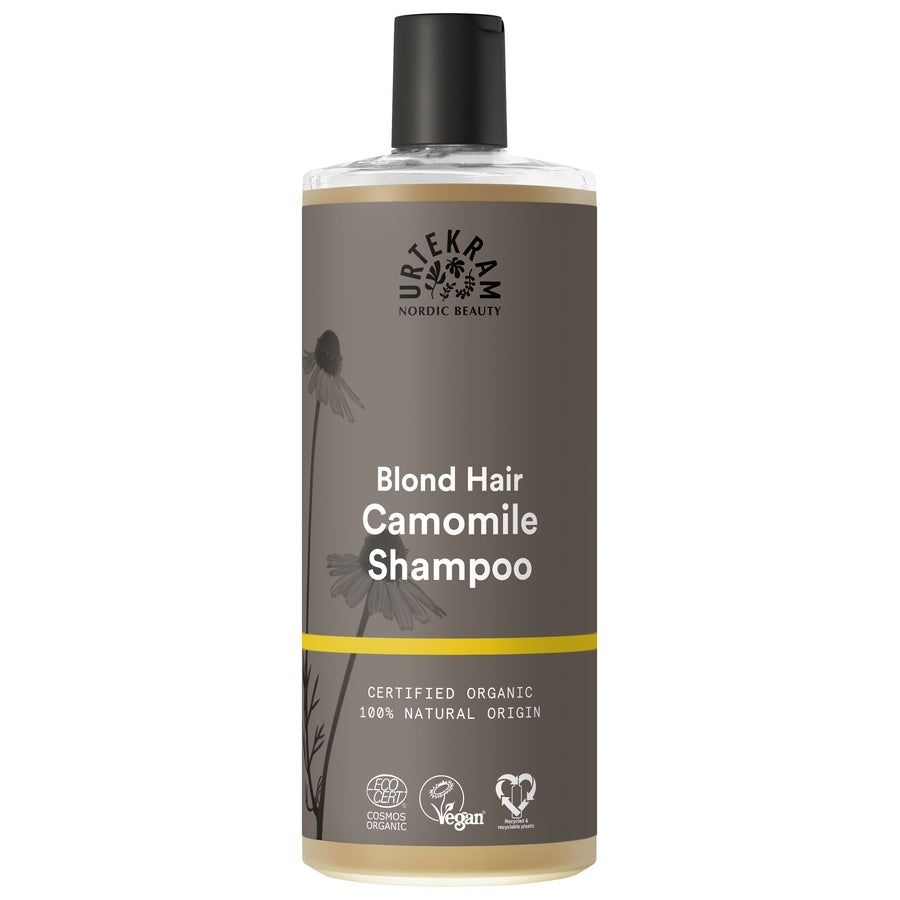 Braune Shampoo-Flasche mit schwarzem Deckel. Aufschrift: Blond Hair Camomile Shampoo. Zertifiziertes Bio-Produkt.